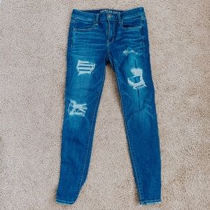 AE jeans with fake holes